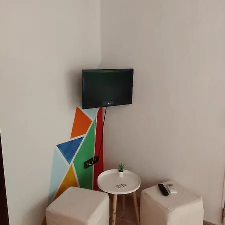 Mi *